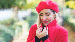 How To Move On After A Divorce. Image of a woman in a red coat and hat. For individual counseling contact The Relationship Therapy Center in Roseville and Fair Oaks California.