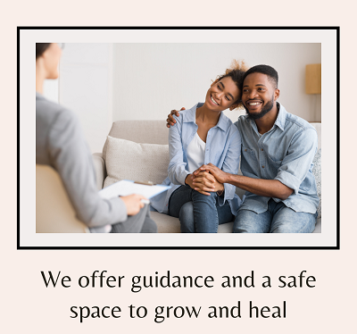 A couple smiles with one another while sitting across someone with a clipboard.  The text below says “we offer guidance and a safe space to grow and heal”. This could represent the support a couples therapist in California can offer. Learn more about