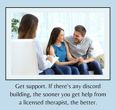 A couple holds hands while sitting across from someone with a clipboard. the text reads “get support. If there’s any discord building, the sooner you get help from a licensed therapist, the better.” Learn more about the support a marriage counselor i