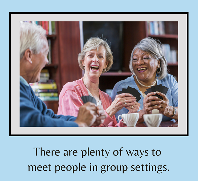 An older group of friends smile and laugh while playing cards. The text under them says “there are plenty of ways to meet people in group settings”. Learn how a couples therapist in California can support you and your relationship by searching “anxie