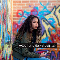 A teen sits with a moody expression while holding a phone. Learn more about the support teen therapy in Roseville, CA can offer by contacting a therapist for teens in Roseville, CA and across California. We offer teen therapy in Sacramento and other