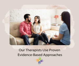 Our Therapists Use Proven Evidence-Based Approaches.  Couple sitting on a couch facing each other and smiling in a therapist office Relationship Therapy Center has locations in Roseville and Fairoaks, California where we specialize in couples counseling with Gottman Trained Licensed Therapists.