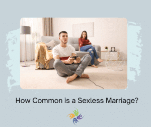 How Common is a Sexless Marriage? Image of man sitting on floor playing a computer game while wife sits on couch looking irritated and lonely. For couples counseling and intimacy therapy contact The Relationship Therapy Center in Roseville and Fair Oaks 